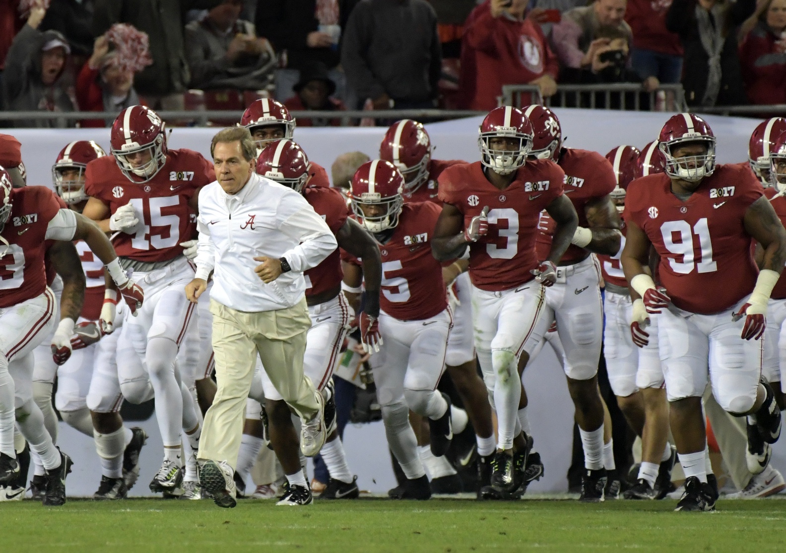 Jan 9, 2017; Tampa, FL, USA; Alabama Crimson Tide head coach Nick Saban leads his team onto the field for the second half against the Clemson Tigers in the 2017 College Football Playoff National Championship Game at Raymond James Stadium. Mandatory Credit: Kirby Lee-USA TODAY Sports