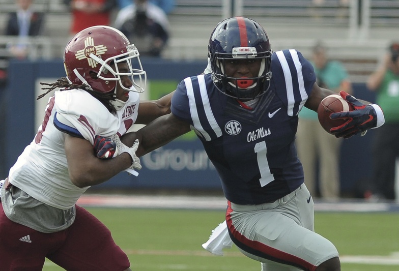 Oct 10, 2015; Oxford, MS, USA; Mississippi Rebels wide receiver Laquon Treadwell (1) carries the ball against New Mexico State Aggies defensive back Lewis Hill (29) during the game at Vaught-Hemingway Stadium. Mandatory Credit: Justin Ford-USA TODAY Sports