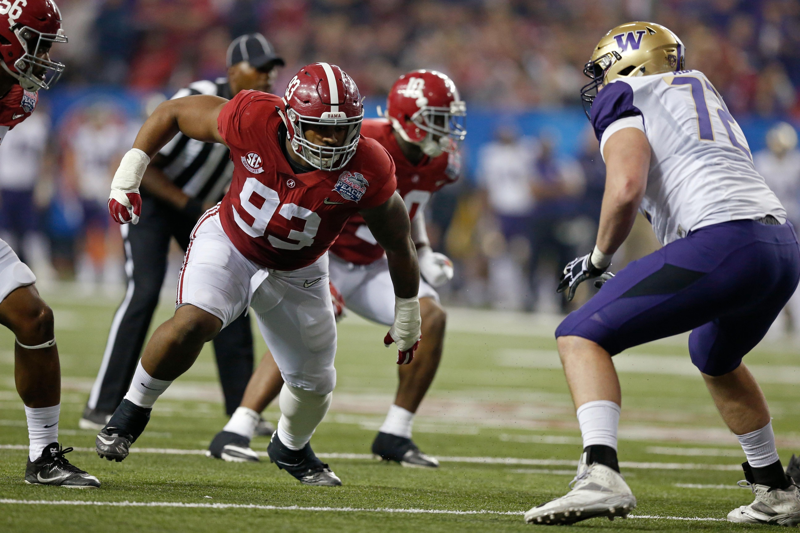 Dec 31, 2016; Atlanta, GA, USA; Alabama Crimson Tide defensive lineman Jonathan Allen (93) goes against Washington Huskies offensive lineman Trey Adams (72) during the second quarter of the 2016 CFP Semifinal at the Georgia Dome. Alabama defeated Washington 24-7. Mandatory Credit: Jason Getz-USA TODAY Sports