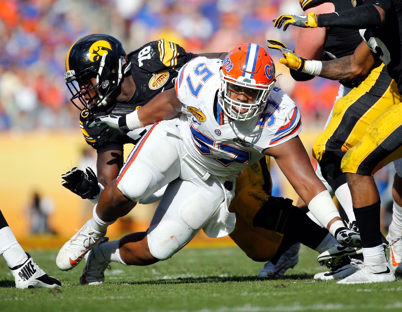 Jan 2, 2017; Tampa , FL, USA; Florida Gators defensive lineman Caleb Brantley (57) rushes against the Iowa Hawkeyes during the second quarter at Raymond James Stadium. Mandatory Credit: Kim Klement-USA TODAY Sports