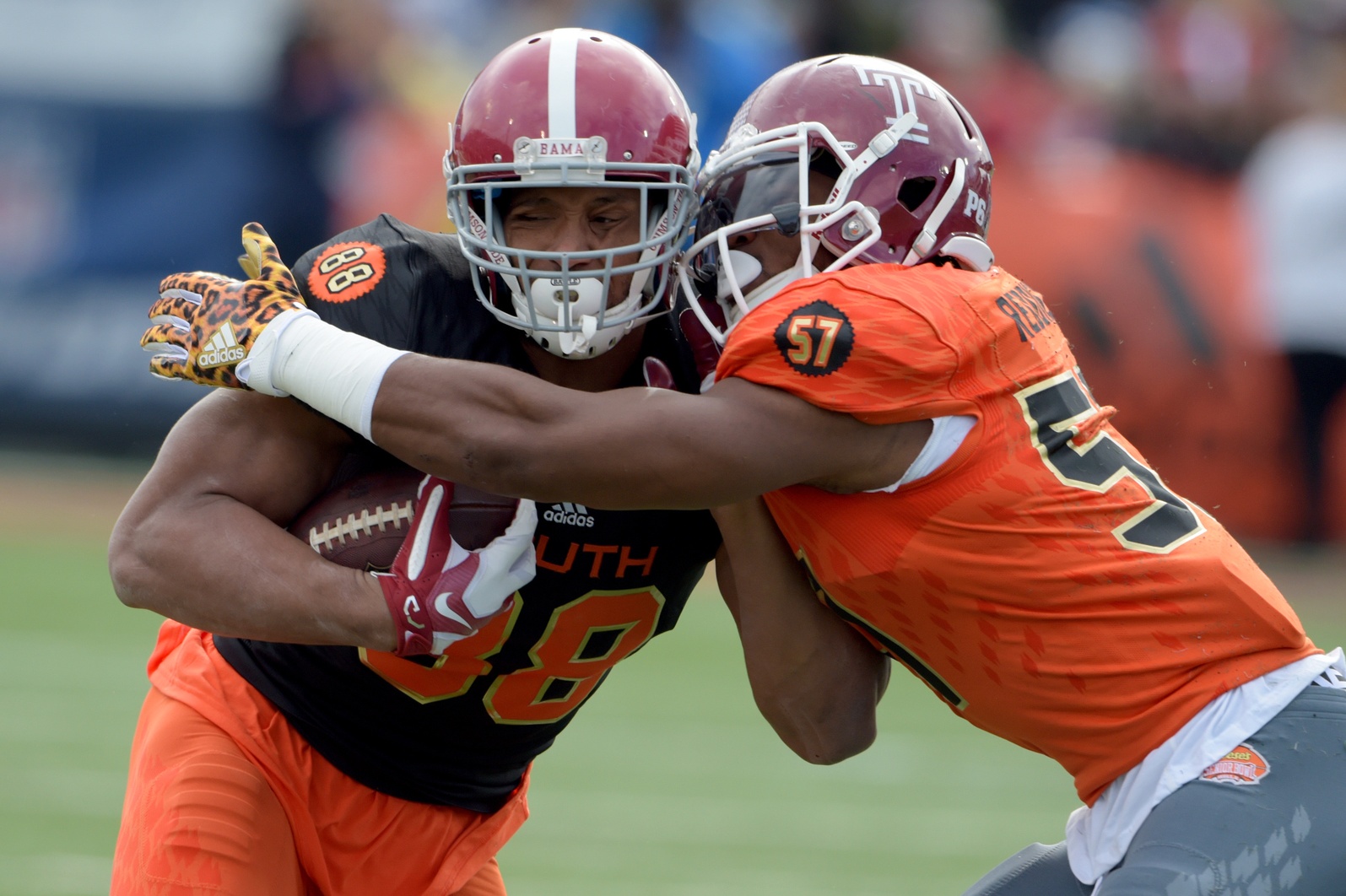 Jan 28, 2017; Mobile, AL, USA; South squad tight end O.J. Howard of Alabama (88) is tackled by North squad inside linebacker Haason Reddick of Temple (57) after a pass reception during the first quarter of the 2017 Senior Bowl at Ladd-Peebles Stadium. Mandatory Credit: Glenn Andrews-USA TODAY Sports