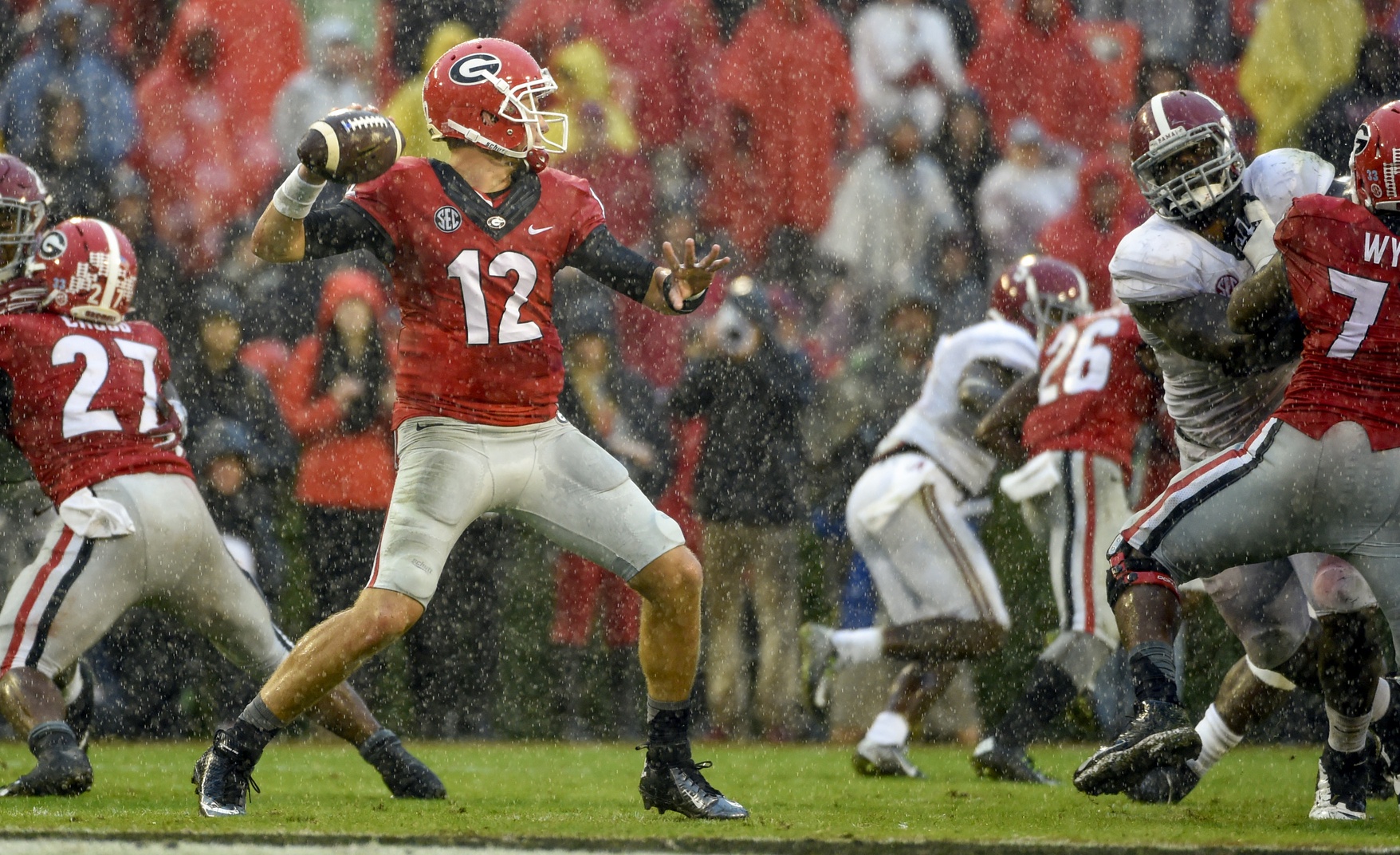 Oct 3, 2015; Athens, GA, USA; Georgia Bulldogs quarterback Brice Ramsey (12) looks to pass during the third quarter against the Alabama Crimson Tide at Sanford Stadium. Alabama defeated Georgia 38-10. Mandatory Credit: John David Mercer-USA TODAY Sports