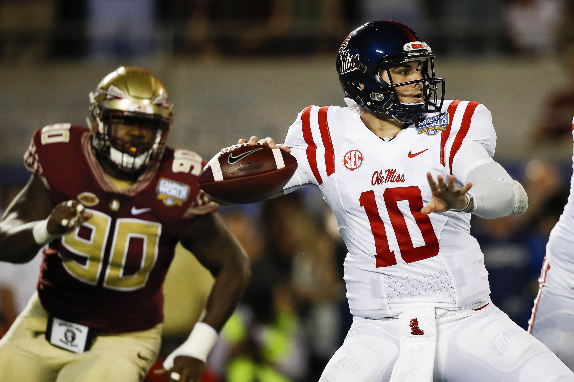 Sep 5, 2016; Orlando, FL, USA; Mississippi Rebels quarterback Chad Kelly (10) drops back to pass in the first quarter against the Florida State Seminoles at Camping World Stadium. Mandatory Credit: Logan Bowles-USA TODAY Sports