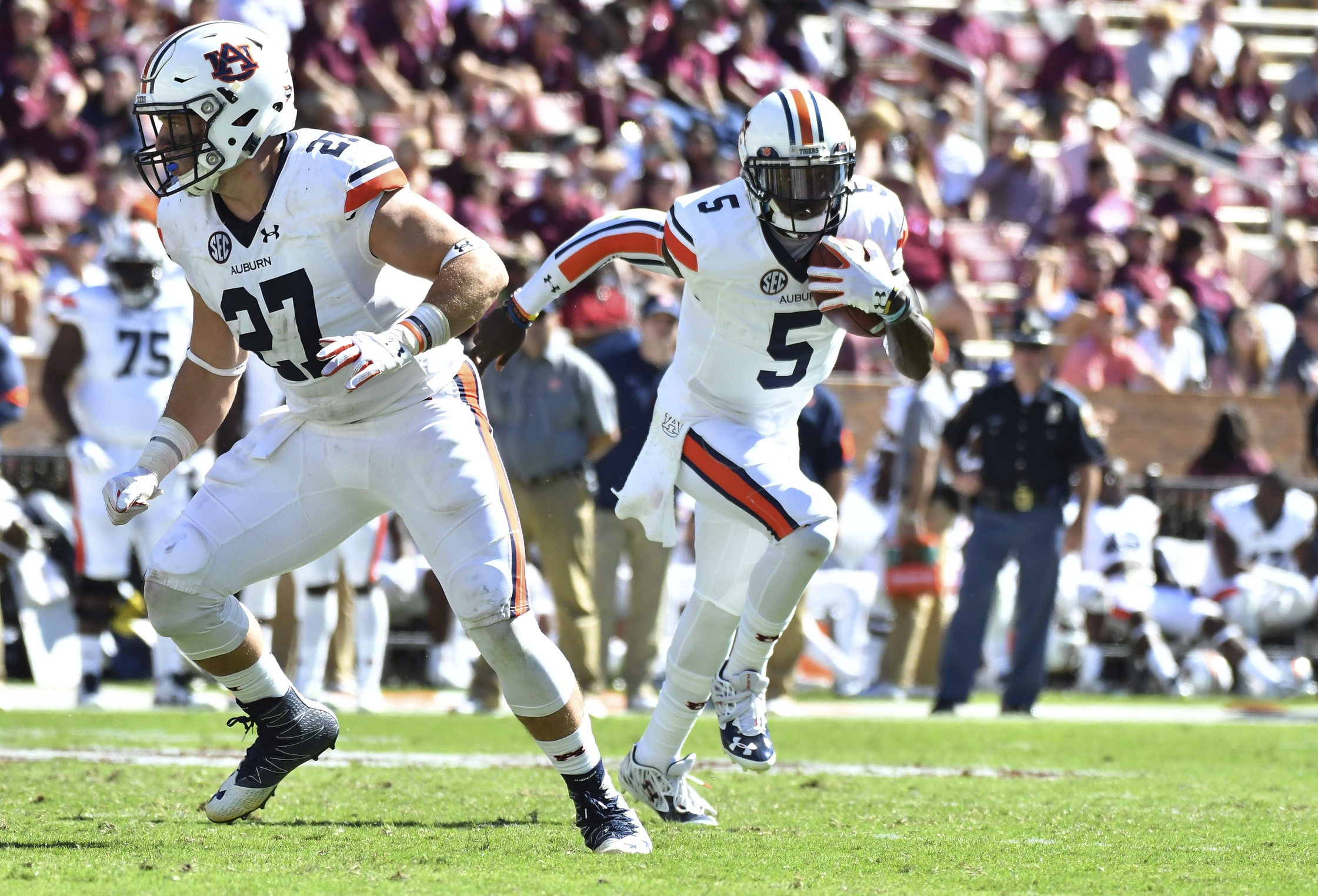 Oct 8, 2016; Starkville, MS, USA; Auburn Tigers quarterback John Franklin III (5) runs the ball during the fourth quarter of the game against the Mississippi State Bulldogs at Davis Wade Stadium. Auburn won 38-14. Mandatory Credit: Matt Bush-USA TODAY Sports