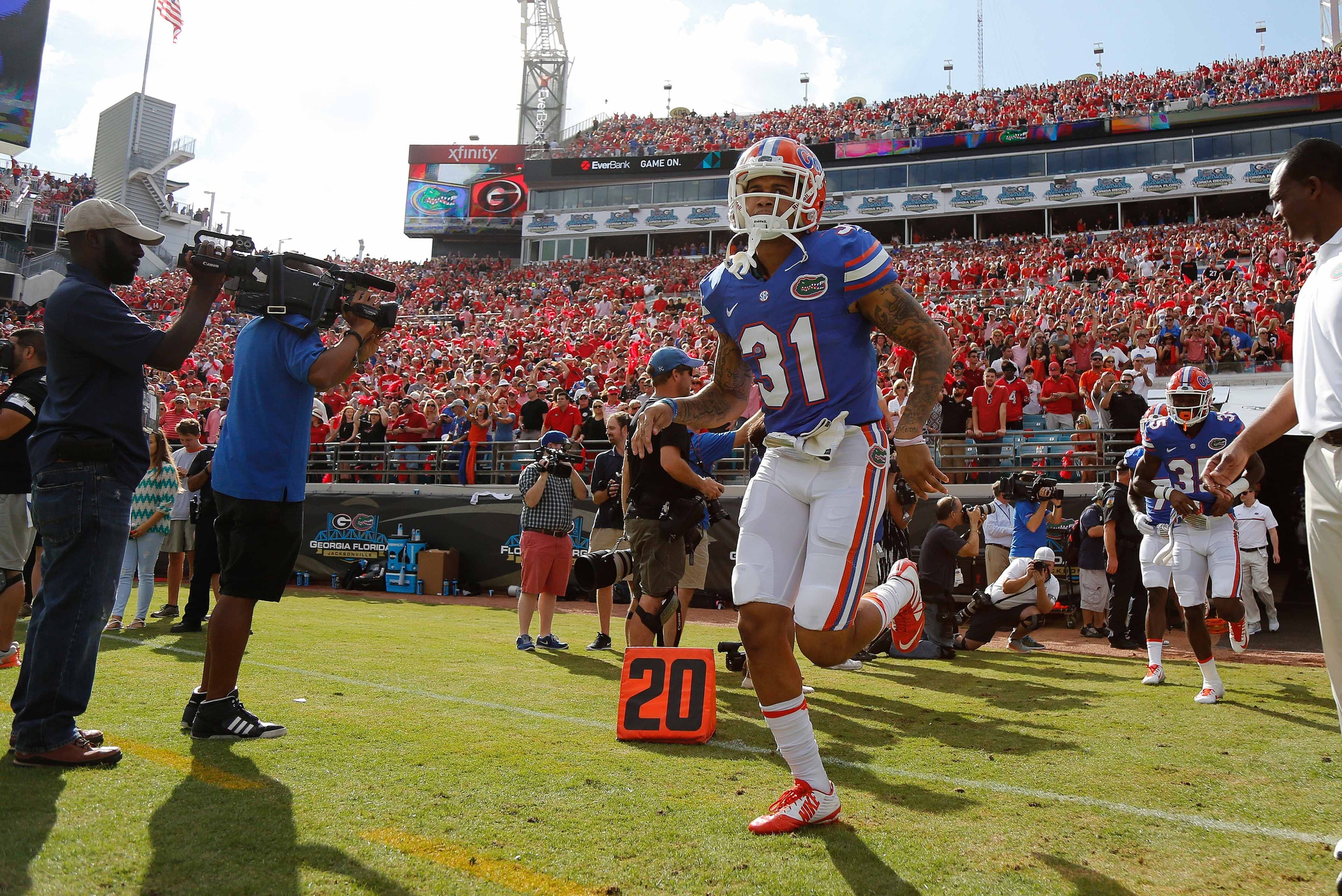 Oct 29, 2016; Jacksonville, FL, USA; Florida Gators defensive back Teez Tabor (31) and teammates run out of the tunnel before the game against the Georgia Bulldogs at EverBank Field. Mandatory Credit: Kim Klement-USA TODAY Sports