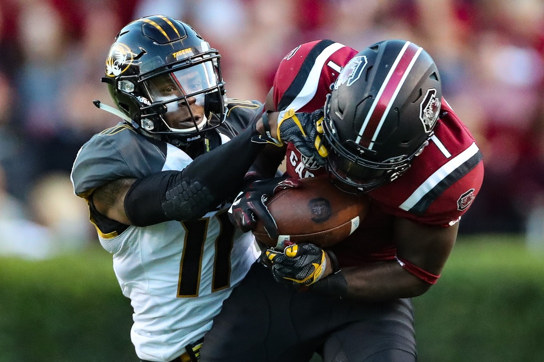 Nov 5, 2016; Columbia, SC, USA; South Carolina Gamecocks wide receiver Deebo Samuel (1) holds on to the ball after the catch as Missouri Tigers defensive back Aarion Penton (11) tries to wrap him up during the game at Williams-Brice Stadium. South Carolina wins 31-21 over Missouri. Mandatory Credit: Jim Dedmon-USA TODAY Sports