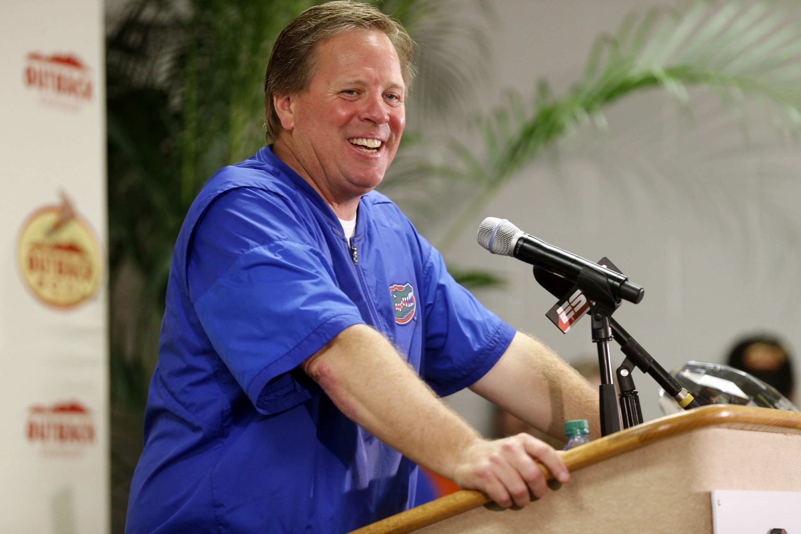 Jan 2, 2017; Tampa , FL, USA; Florida Gators head coach Jim McElwain speaks to the media while presentint the trophy during a press conference after defeating Iowa Hawkeyes 30-3 at Raymond James Stadium. Mandatory Credit: Kim Klement-USA TODAY Sports