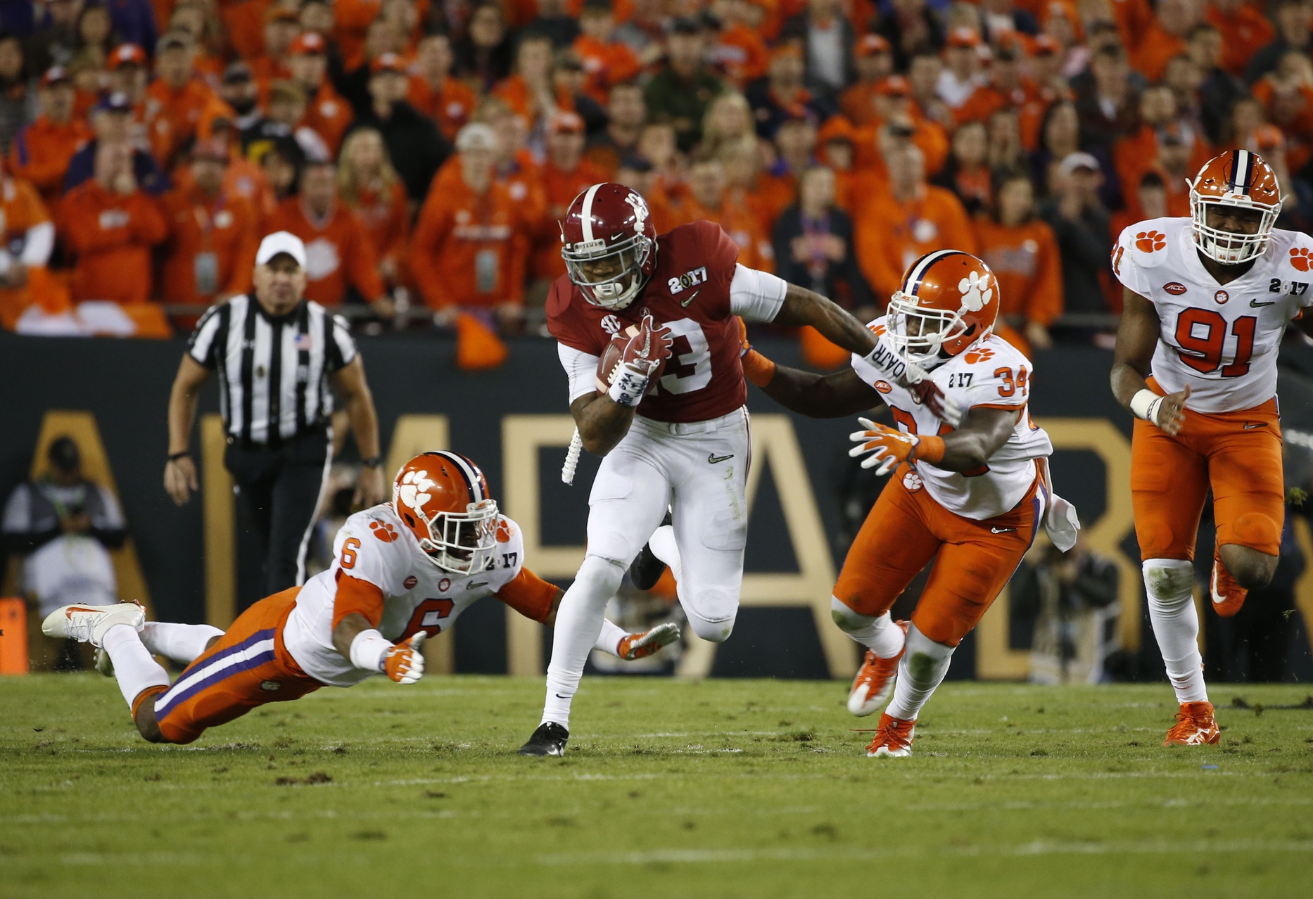 Jan 9, 2017; Tampa, FL, USA; Alabama Crimson Tide wide receiver ArDarius Stewart (13) runs the ball against Clemson Tigers linebacker Dorian O'Daniel (6) and linebacker Kendall Joseph (34) in the 2017 College Football Playoff National Championship Game at Raymond James Stadium. Mandatory Credit: Kim Klement-USA TODAY Sports