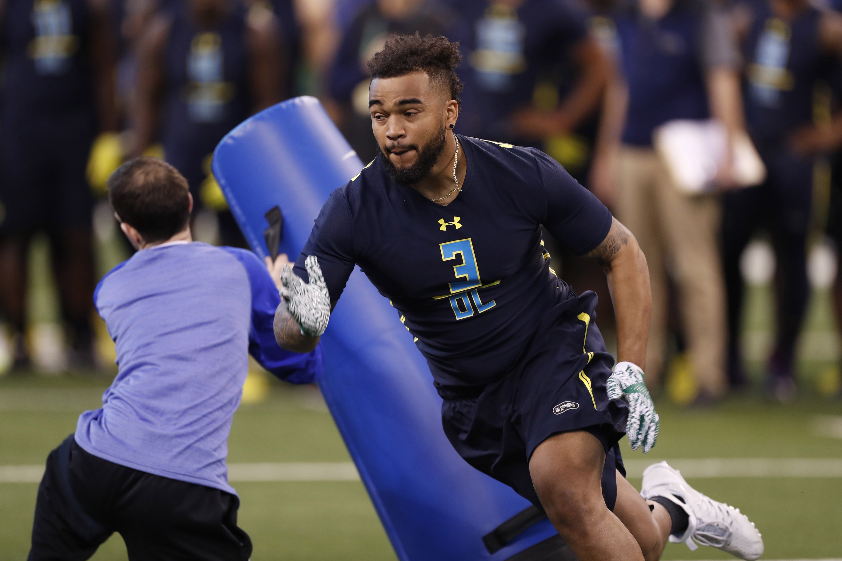 Mar 5, 2017; Indianapolis, IN, USA; Tennessee Volunteers defensive lineman Derek Barnett goes through workout drills during the 2017 NFL Combine at Lucas Oil Stadium. Mandatory Credit: Brian Spurlock-USA TODAY Sports