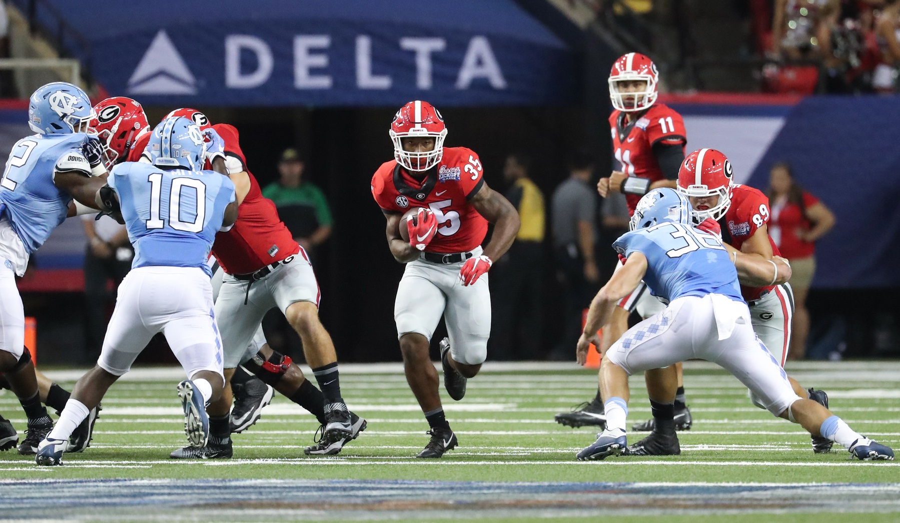 Sep 3, 2016; Atlanta, GA, USA; Georgia Bulldogs running back Brian Herrien (35) runs for yards during the 2016 Chick-Fil-A Kickoff game against the North Carolina Tar Heels at Georgia Dome. Georgia won 33-24. Mandatory Credit: Jason Getz-USA TODAY Sports