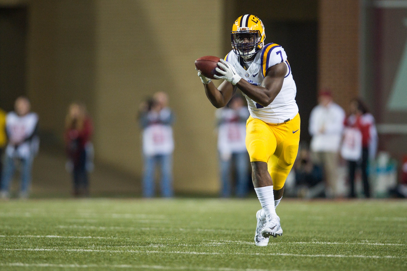 Nov 12, 2016; Fayetteville, AR, USA; LSU Tigers running back Leonard Fournette (7) makes a reception during the first quarter of the game agains the Arkansas Razorbacks at Donald W. Reynolds Razorback Stadium. Mandatory Credit: Brett Rojo-USA TODAY Sports