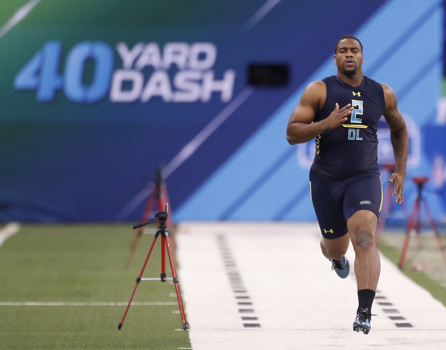 Mar 5, 2017; Indianapolis, IN, USA; Alabama Crimson Tide defensive lineman Jonathan Allen runs the 40 yard dash during the 2017 NFL Combine at Lucas Oil Stadium. Mandatory Credit: Brian Spurlock-USA TODAY Sports