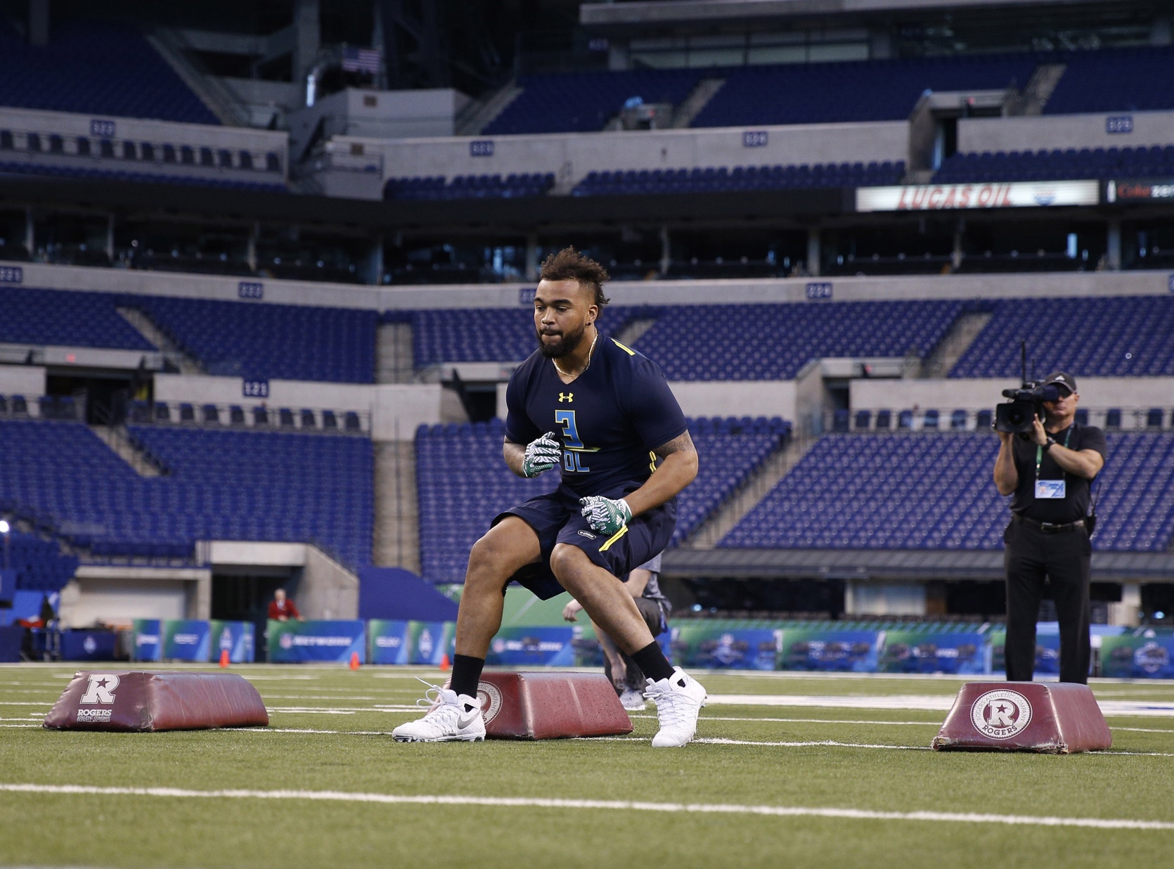 Mar 5, 2017; Indianapolis, IN, USA; Tennessee Volunteers defensive lineman Derek Barnett goes through workout drills during the 2017 NFL Combine at Lucas Oil Stadium. Mandatory Credit: Brian Spurlock-USA TODAY Sports