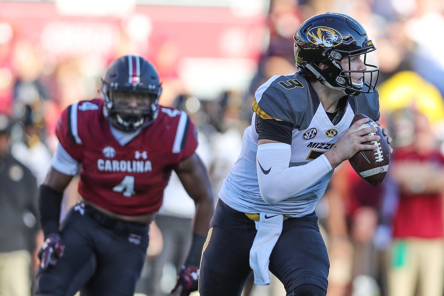 Nov 5, 2016; Columbia, SC, USA; Missouri Tigers quarterback Drew Lock (3) looks for his receiver as South Carolina Gamecocks linebacker Bryson Allen-Williams (4) comes in for a sack at Williams-Brice Stadium. Mandatory Credit: Jim Dedmon-USA TODAY Sports