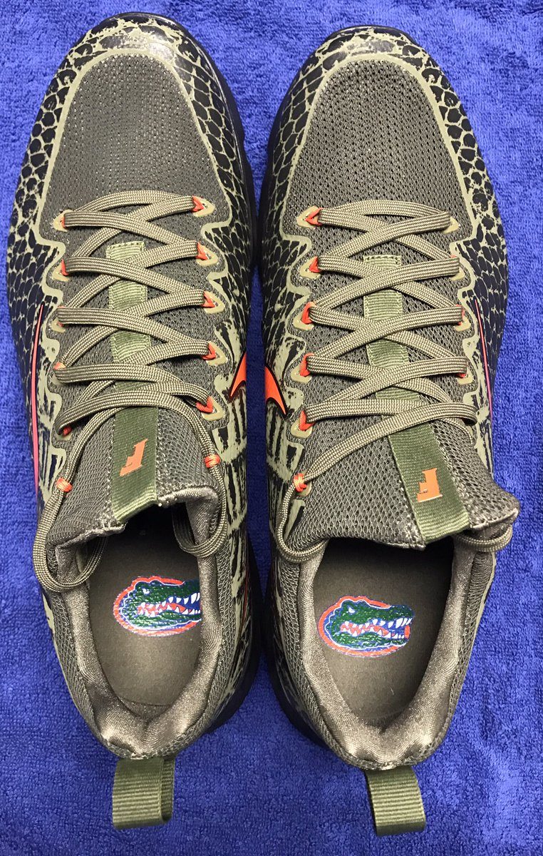 LOOK: Nike creates green sneakers with chrome orange plates for Florida