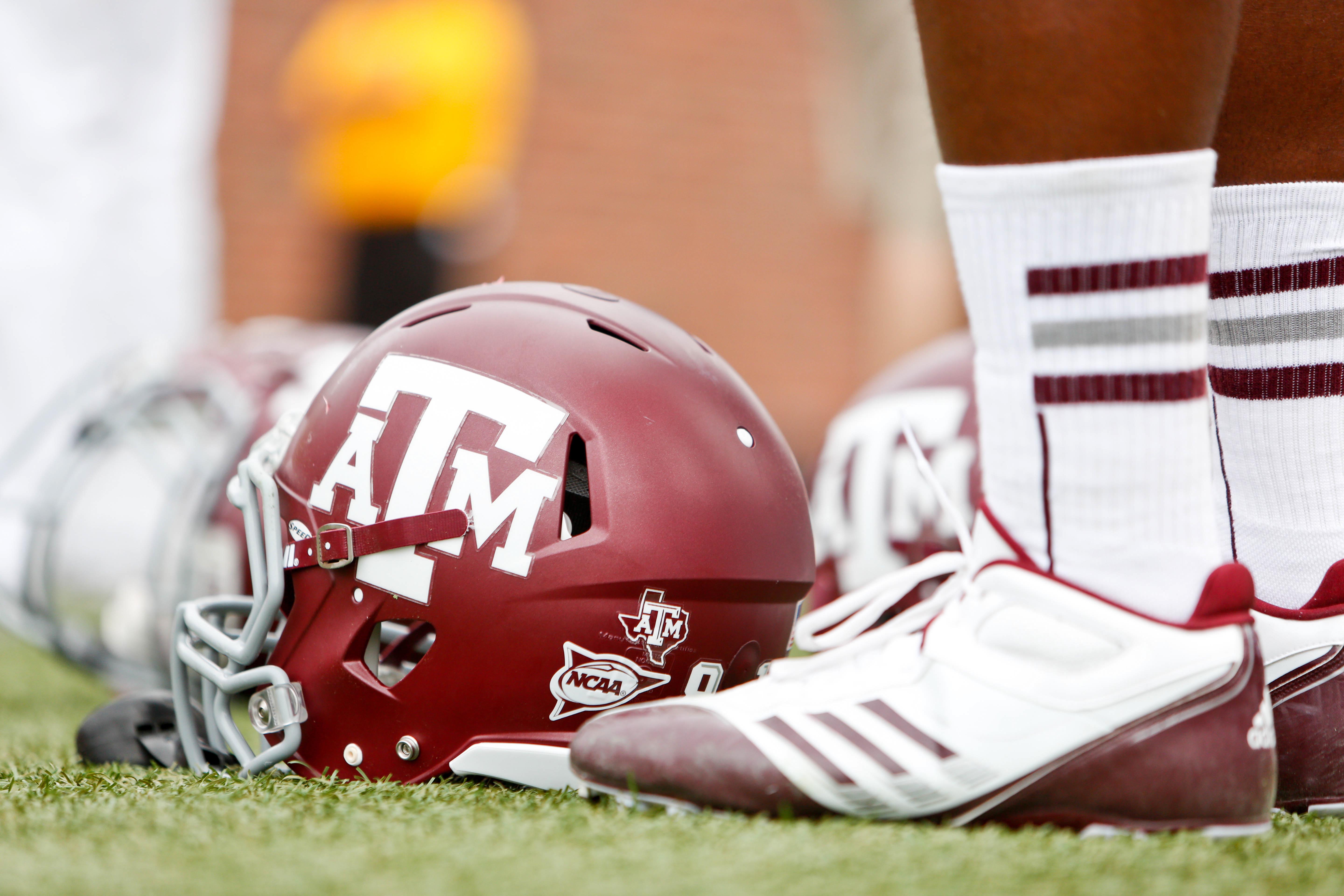 A Texas A&M helmet on the sidelines.