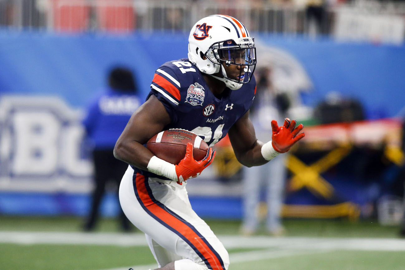 Kerryon Johnson carries the ball for Auburn.