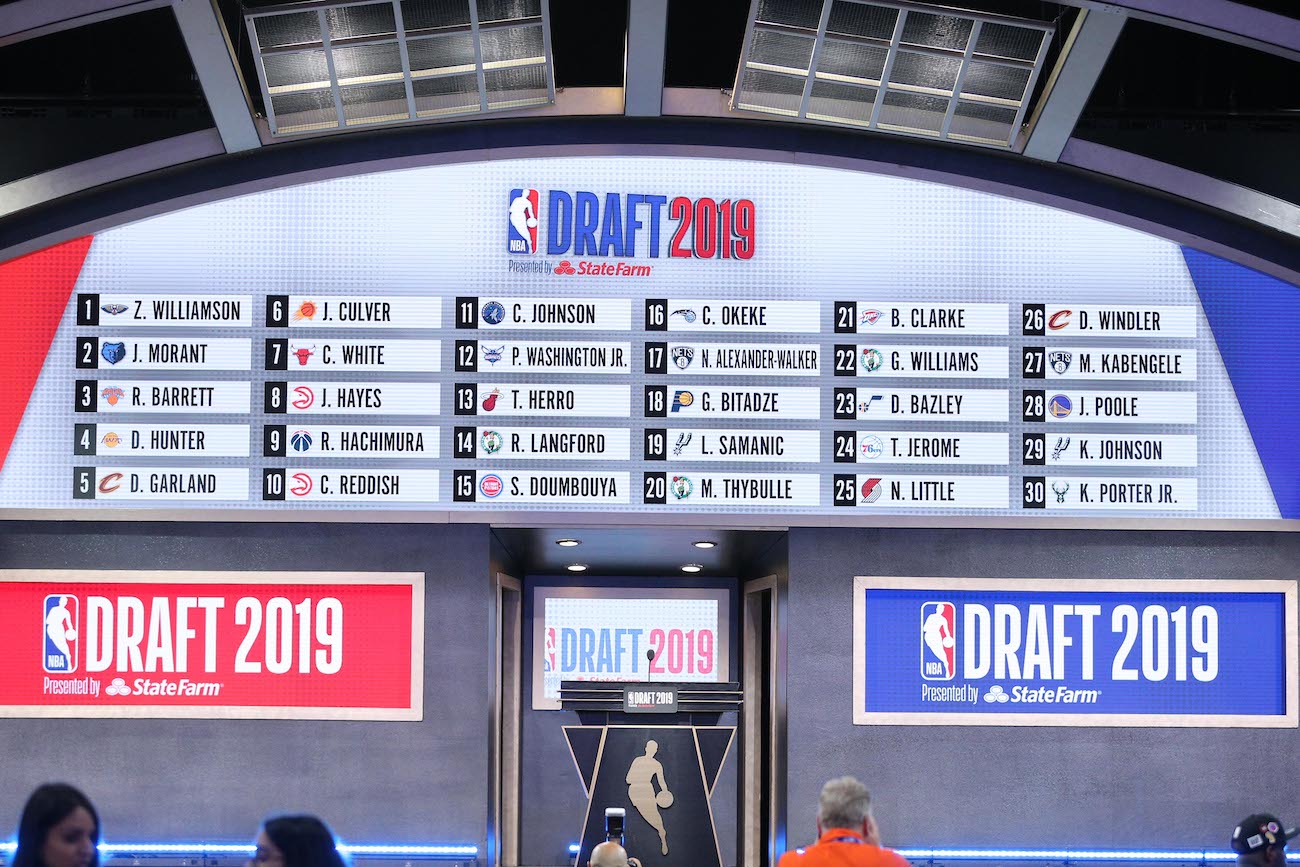 An NBA Draft board is shown.
