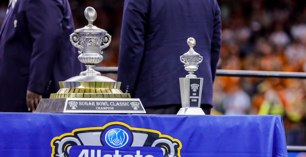 Sugar Bowl champion trophy and Most Outstanding Player trophy.