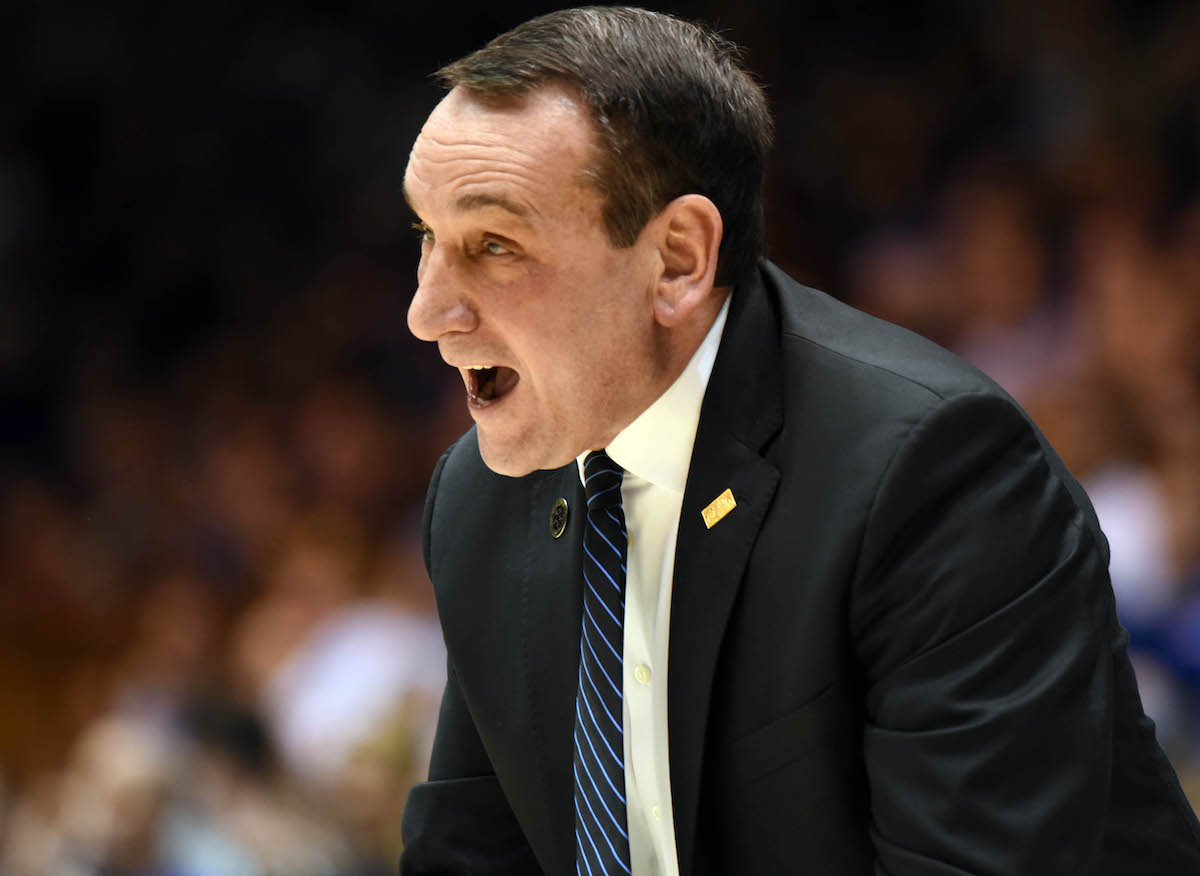 Mike Krzyzewski coaches during a game.