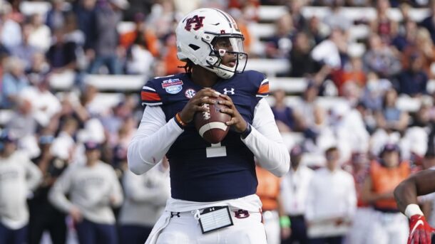 TJ Finley looks to throw a pass during a game.