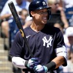Aaron Judge smiles as he steps to the plate for the New York Yankees during spring training.