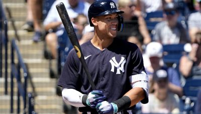 Aaron Judge smiles as he steps to the plate for the New York Yankees during spring training.