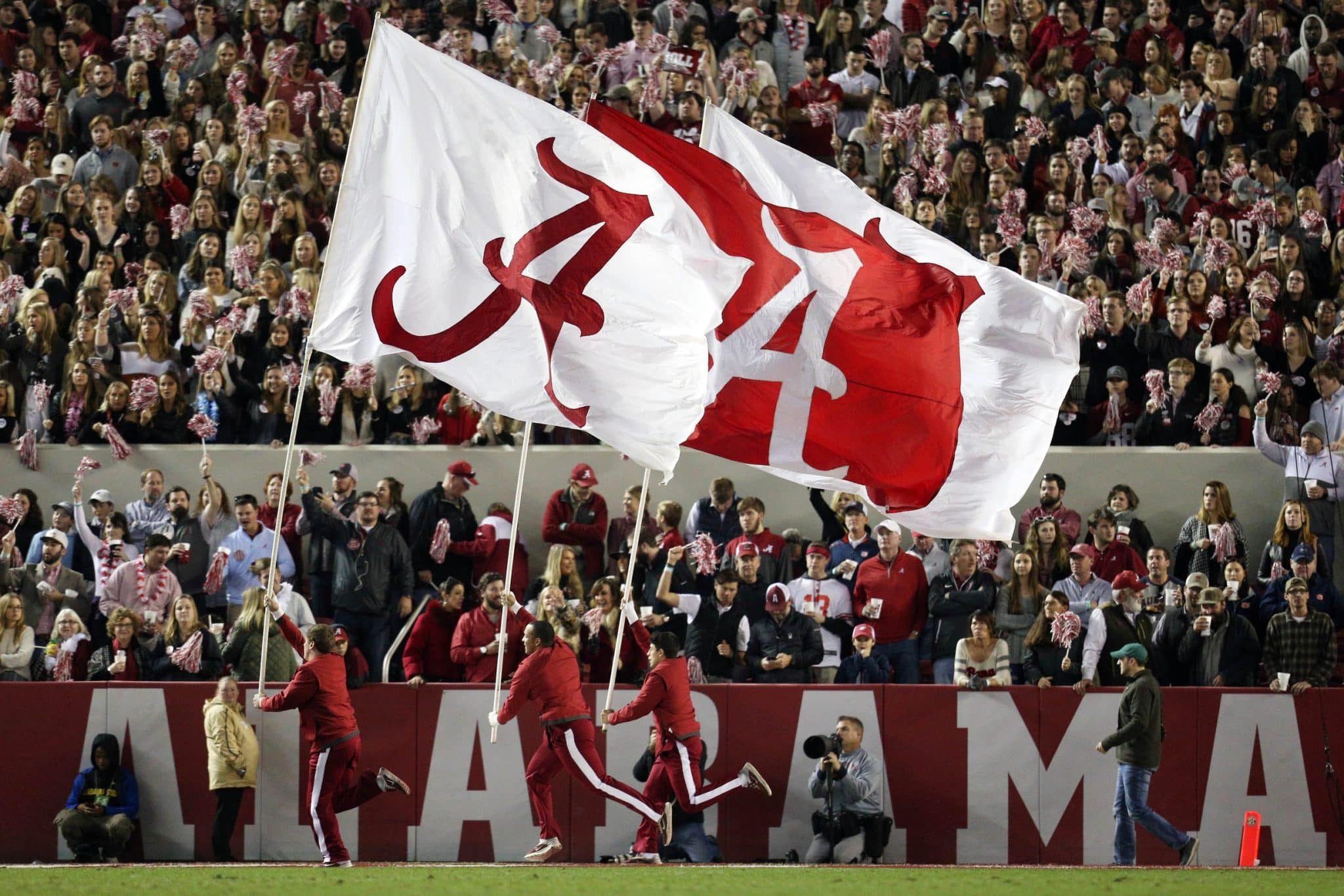 Alabama football flags are pictured.