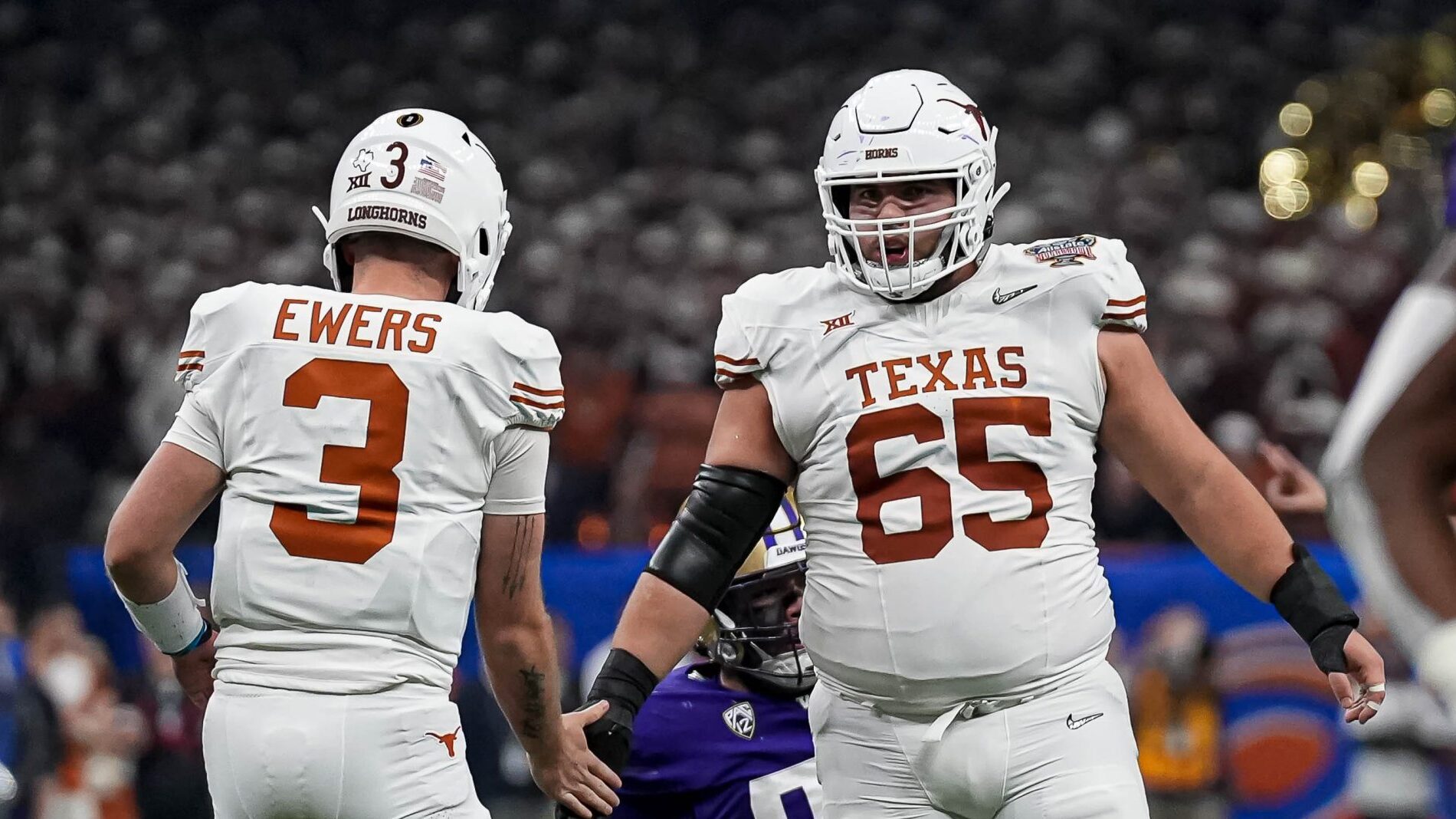 Texas C Jake Majors leaves CFP game with injury