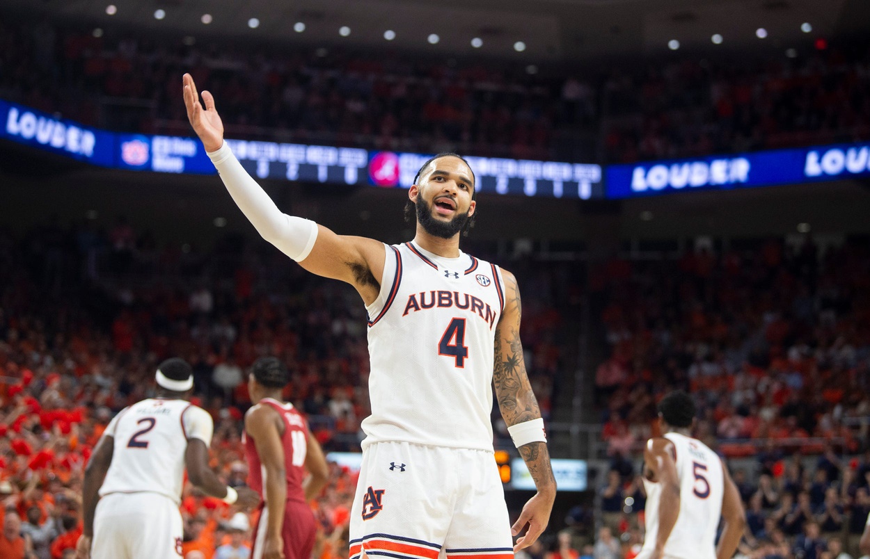 Johni Broome pumps up the crowd during a game.