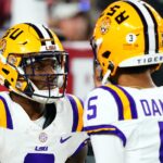 Jayden Daniels celebrates with Malik Nabers.