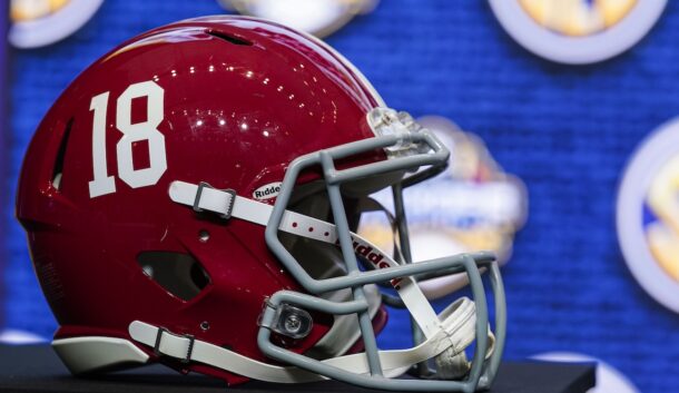 An Alabama football helmet sits on a table during SEC Media Days in 2022.