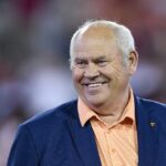 Phillip Fulmer stands on the field before the Gator Bowl following the 2019 college football season.