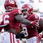 Deion Burks and Taylor Tatum celebrate.