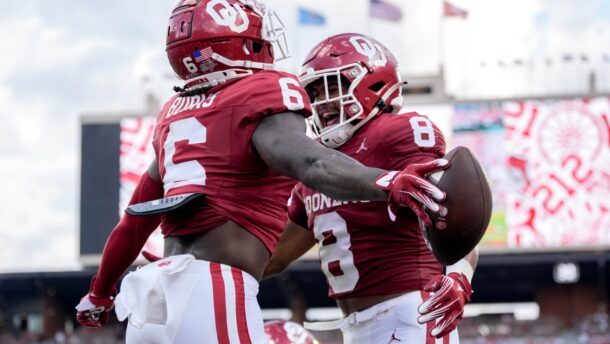 Deion Burks and Taylor Tatum celebrate.