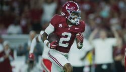 Ryan Williams runs toward the end zone after making a catch for Alabama against Western Kentucky.