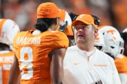 Nico Iamaleava and Josh Heupel during a game.
