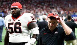 Kirby Smart walks off the field after a Georgia loss.