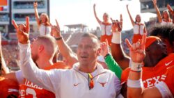 Steve Sarkisian and Texas sing the alma mater.