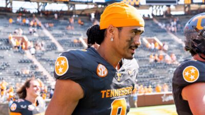 Nico Iamaleava on the sidelines during a game.