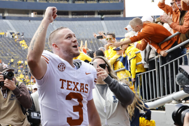 Quinn Ewers celebrates with Texas fans.