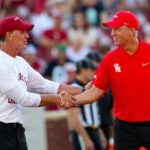 Oklahoma coach Brent Venables shakes hands with Houston coach Willie Fritz before a game on Saturday, Sept. 7, 2024.