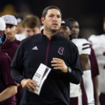 Jeff Lebby stands on the sidelines of a Mississippi State game.