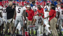 Kirby Smart speaks to the Georgia players during a timeout against Kentucky.