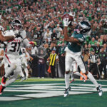 DeVonta Smith catches a touchdown pass in 2024.