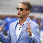 Lane Kiffin participates in an interview before an Ole Miss game in 2024.