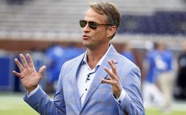 Lane Kiffin participates in an interview before an Ole Miss game in 2024.