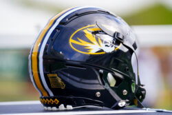 Mizzou helmet show on sideline.