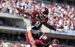 Texas A&M RB Le'Veon Moss celebrates after scoring 1 of his 3 touchdowns against Mizzou.