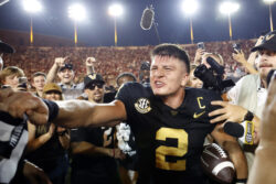 Diego Pavia celebrates Vanderbilt's win over Alabama.
